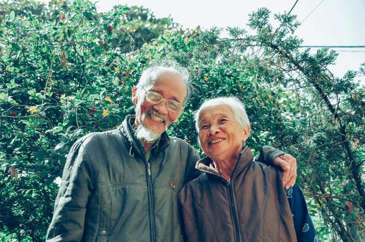 a smiling older couple