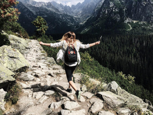A woman hiking on a trail in Santa Monica