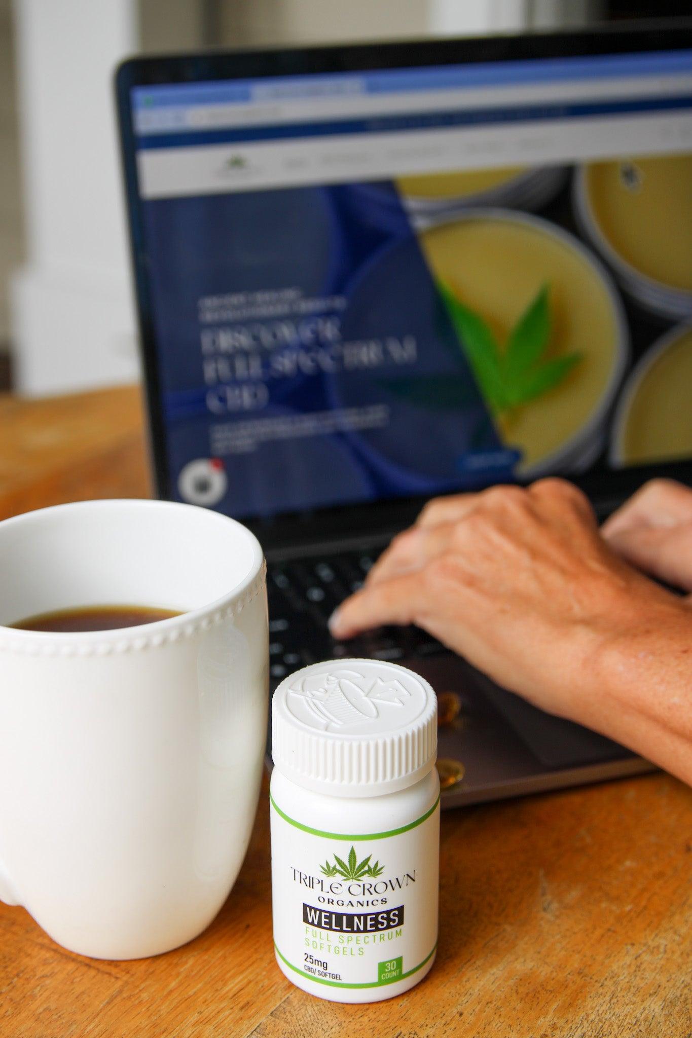 wellness_softgel_with_coffee_and_laptop - Triple Crown Organics