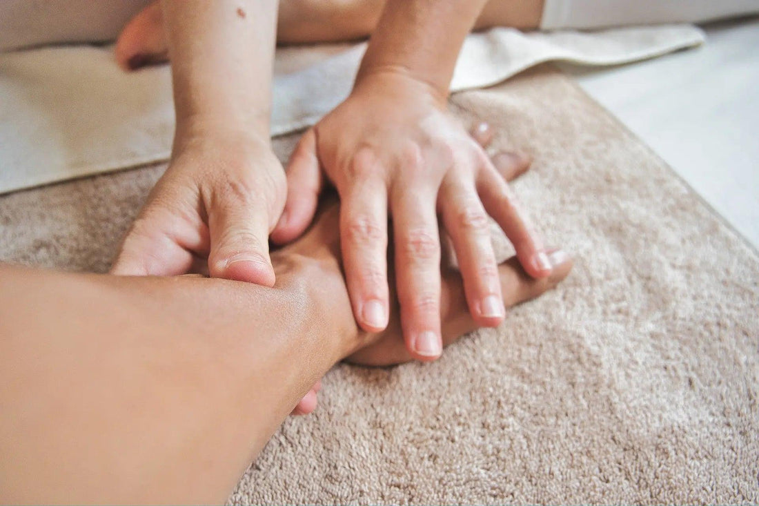 a woman getting a massage on her wrist